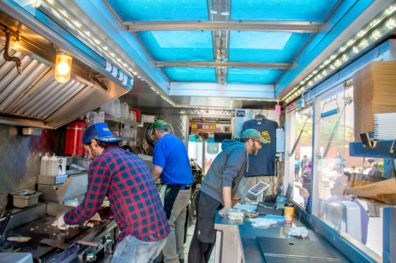 Cooking and taking orders inside a food truck